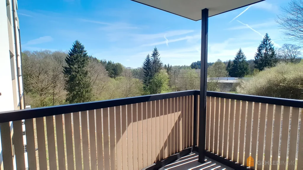 Terrasse d'un appartement neuf à vendre dans la Résidence Les Abords du Lac à Robertville